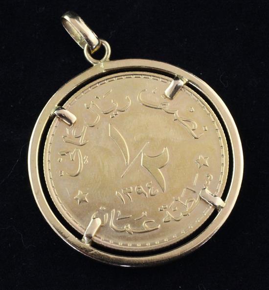 A Sultanate of Oman gold proof half rial in pendant mount.